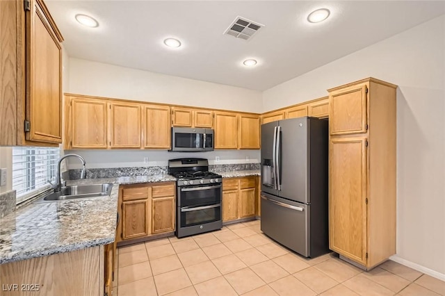 kitchen featuring light tile patterned floors, visible vents, recessed lighting, a sink, and appliances with stainless steel finishes