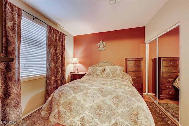 bedroom with visible vents