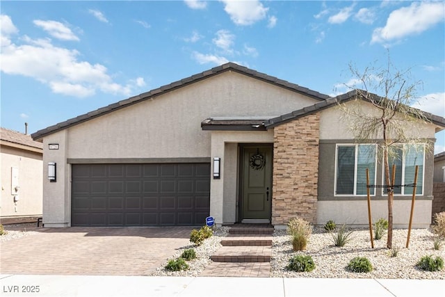 single story home featuring stucco siding, decorative driveway, and a garage