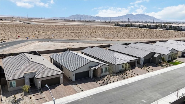 drone / aerial view with a mountain view and a residential view