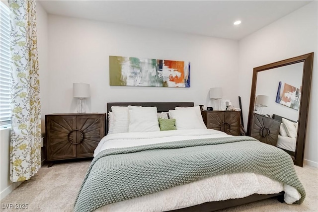 carpeted bedroom featuring recessed lighting, multiple windows, and baseboards