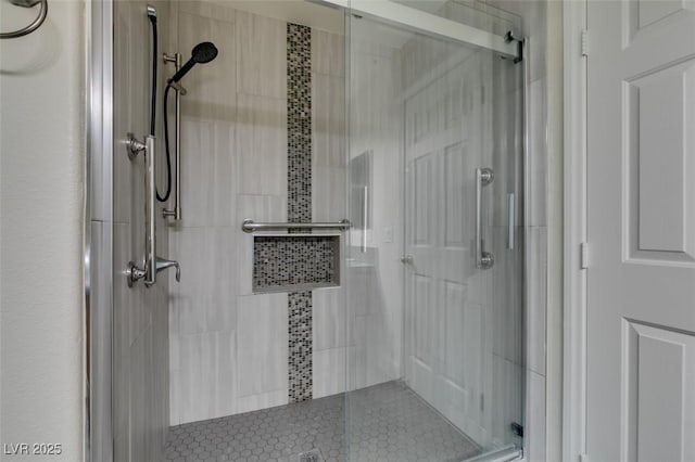 bathroom with a stall shower