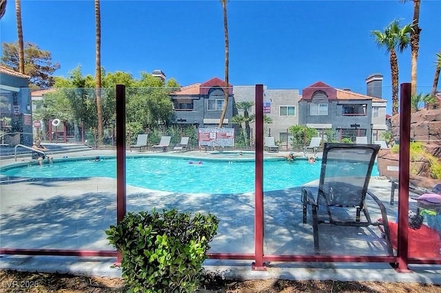 pool featuring fence