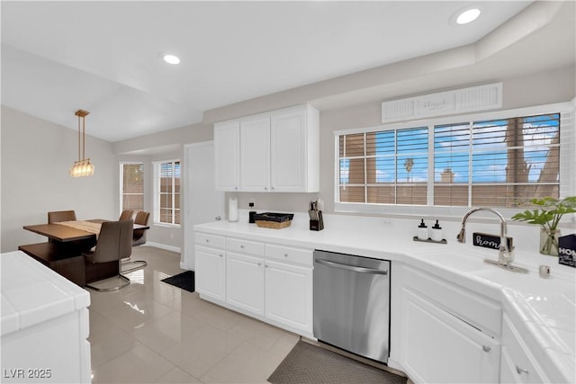 kitchen with recessed lighting, decorative light fixtures, dishwasher, and white cabinetry