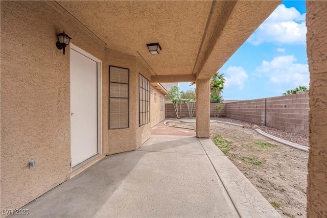 view of patio with a fenced backyard