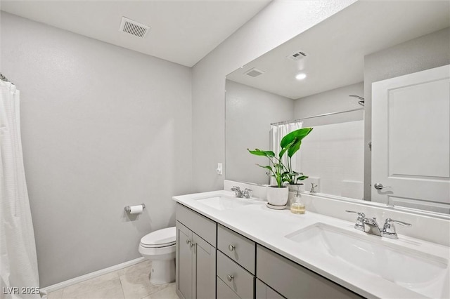 full bathroom featuring tile patterned flooring, toilet, visible vents, and a sink