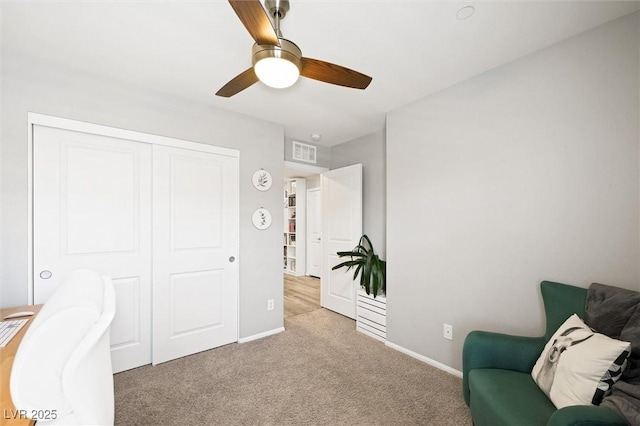 home office with visible vents, baseboards, ceiling fan, and carpet floors