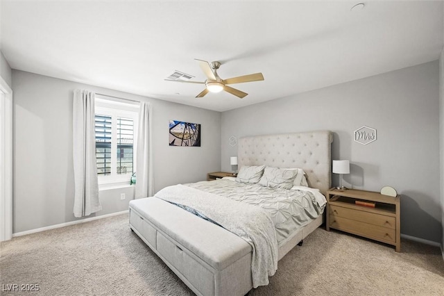 bedroom with visible vents, baseboards, carpet, and a ceiling fan