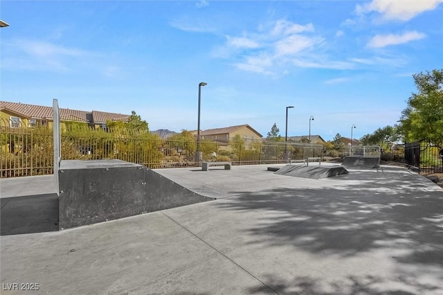 view of road featuring concrete driveway