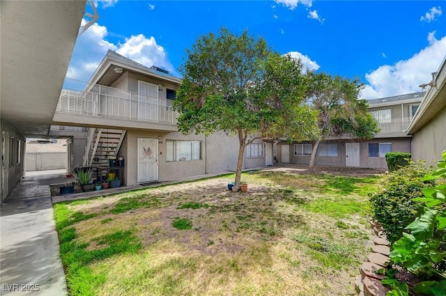 view of yard with stairs