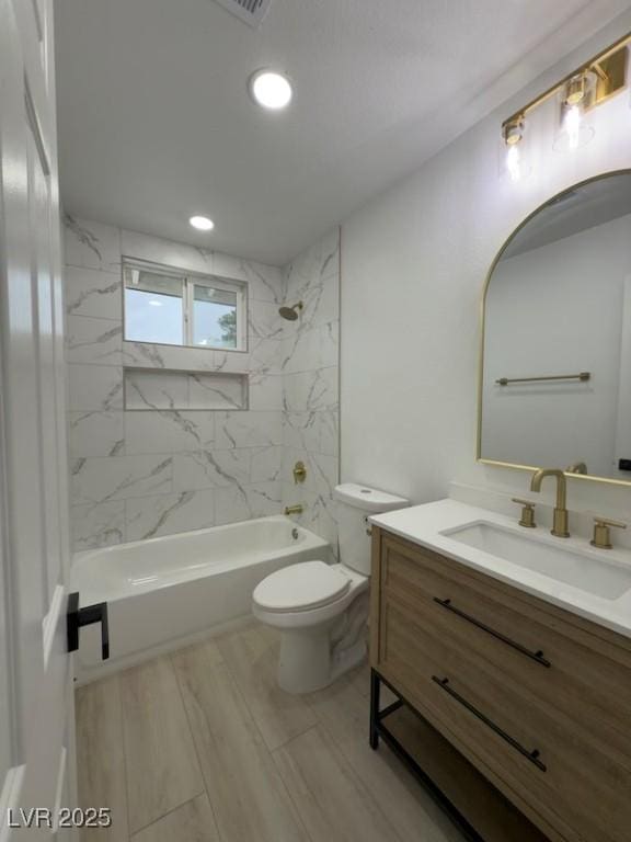 full bath with recessed lighting, shower / bath combination, toilet, and vanity