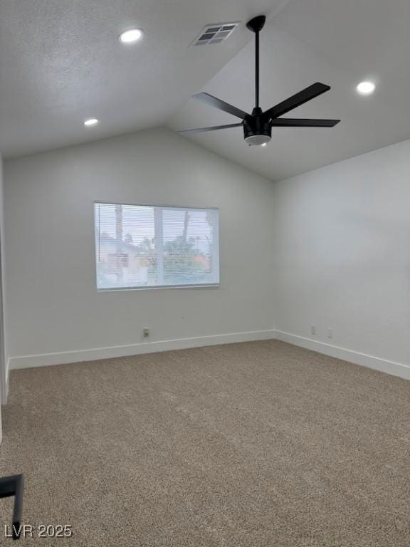 carpeted spare room featuring visible vents, baseboards, lofted ceiling, recessed lighting, and a ceiling fan