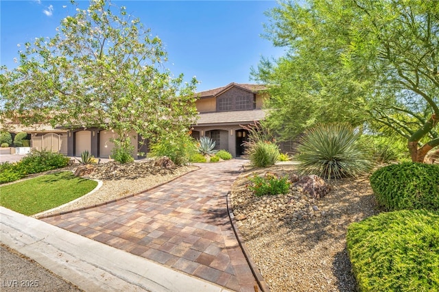 view of front of house featuring decorative driveway