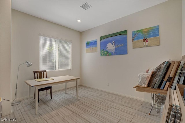 office featuring recessed lighting, baseboards, and visible vents