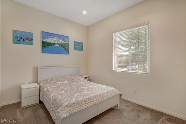 bedroom with recessed lighting, baseboards, and carpet floors