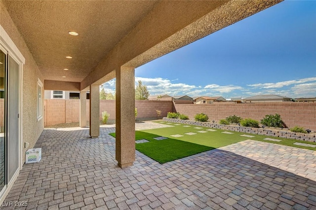 view of patio featuring a fenced backyard