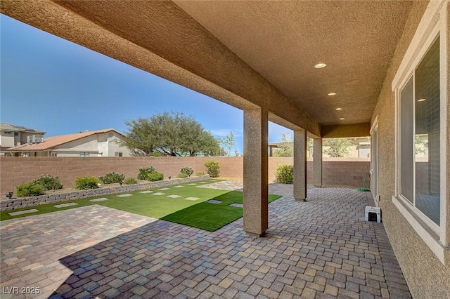 view of patio featuring a fenced backyard