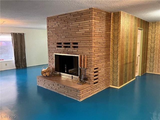 room details featuring a fireplace, concrete floors, and a textured ceiling