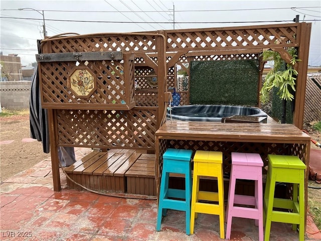 view of patio / terrace with outdoor dry bar