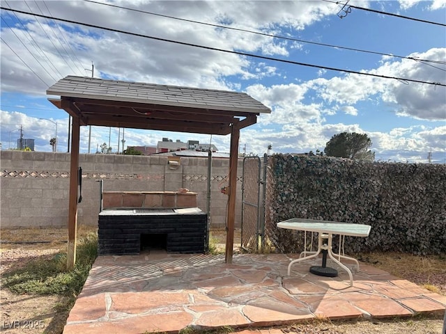 view of patio with fence