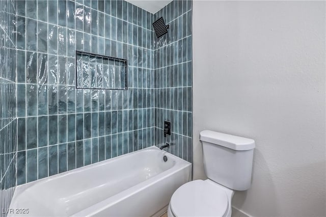 bathroom with toilet and tub / shower combination