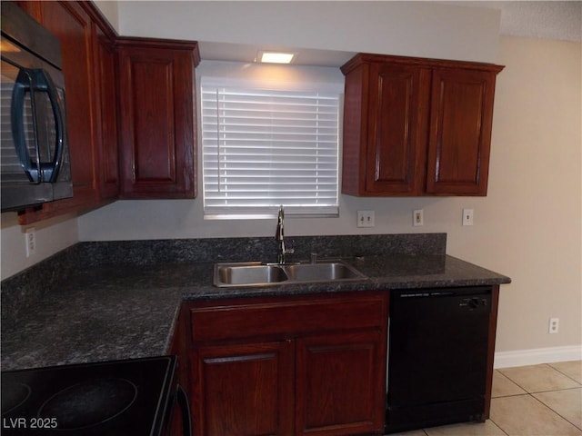 kitchen with black appliances, light tile patterned floors, baseboards, and a sink