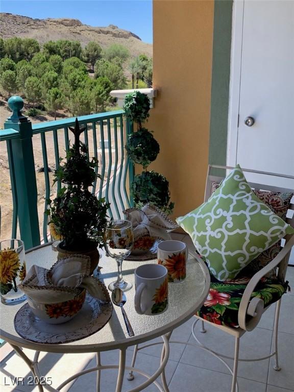 balcony featuring a mountain view