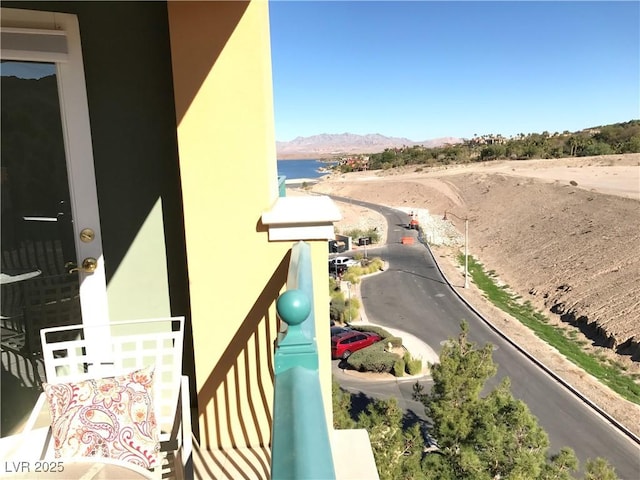 balcony featuring a mountain view