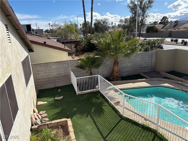 view of pool featuring a fenced backyard and a fenced in pool