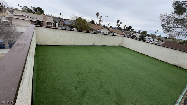 view of yard featuring a residential view