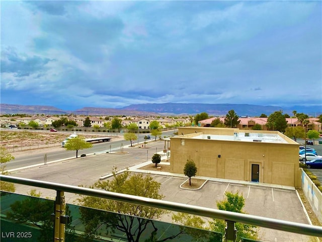 exterior space with a residential view and a mountain view
