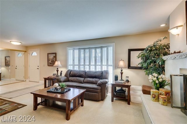 living room featuring light carpet