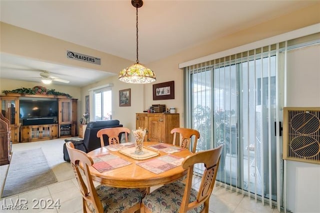 dining space with a ceiling fan