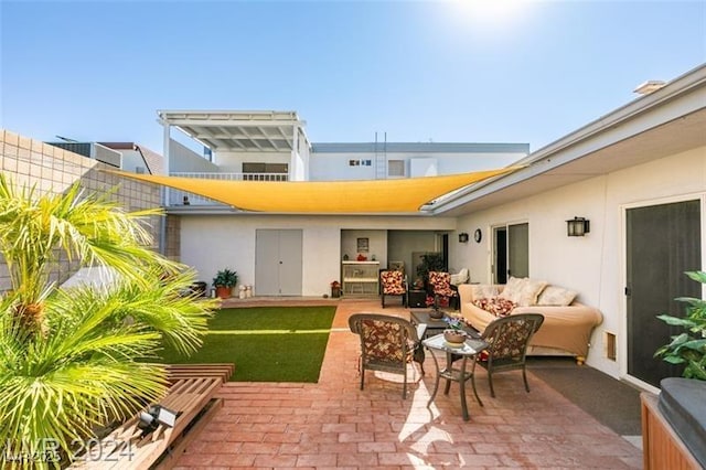 view of patio with outdoor lounge area