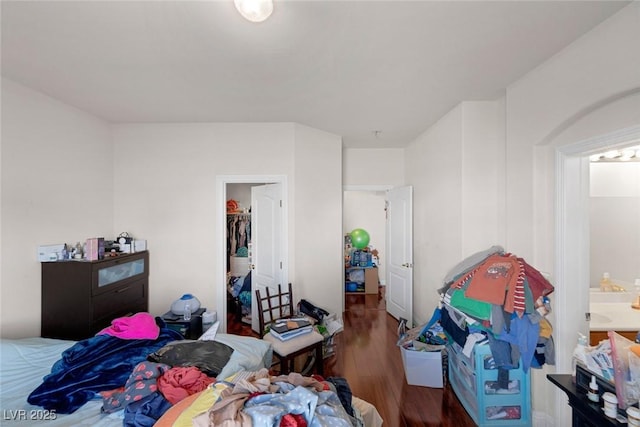 bedroom with wood finished floors