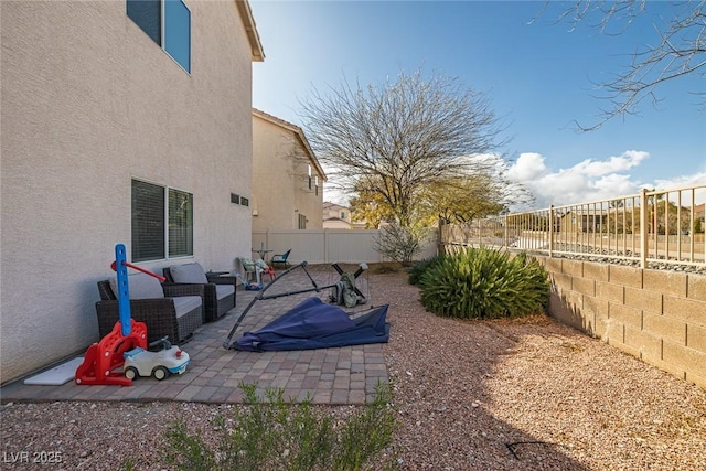 view of yard featuring a patio and a fenced backyard