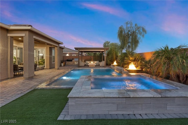 pool at dusk featuring a fenced in pool, an outdoor living space with a fire pit, a fenced backyard, an in ground hot tub, and a patio