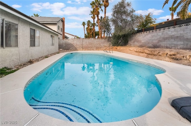 view of swimming pool featuring a fenced in pool and a fenced backyard