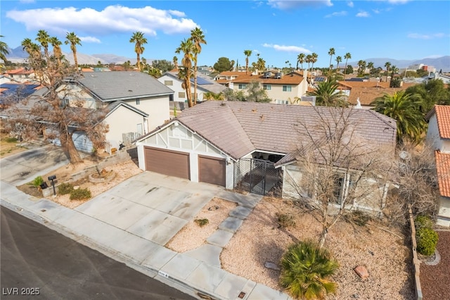 aerial view featuring a residential view and a mountain view