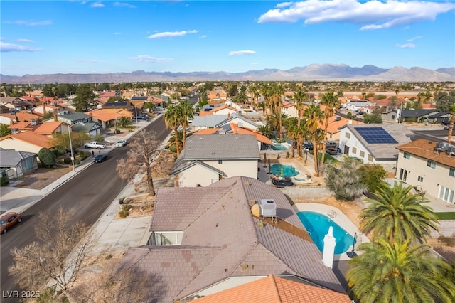 birds eye view of property with a residential view and a mountain view