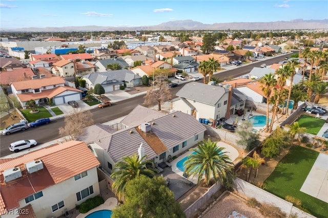 aerial view with a residential view and a mountain view