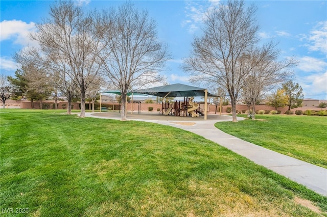 surrounding community with a lawn and playground community