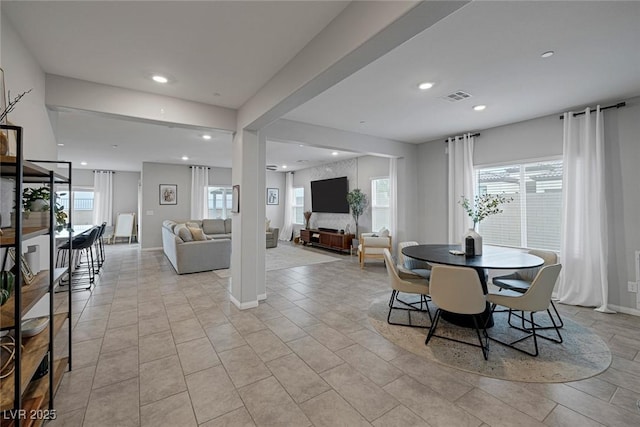 dining room with recessed lighting, visible vents, baseboards, and light tile patterned flooring