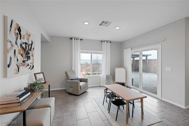 interior space with visible vents, recessed lighting, and baseboards