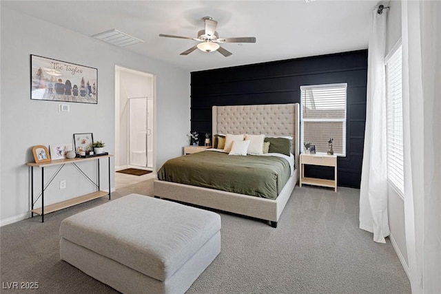 bedroom featuring carpet flooring, baseboards, and visible vents