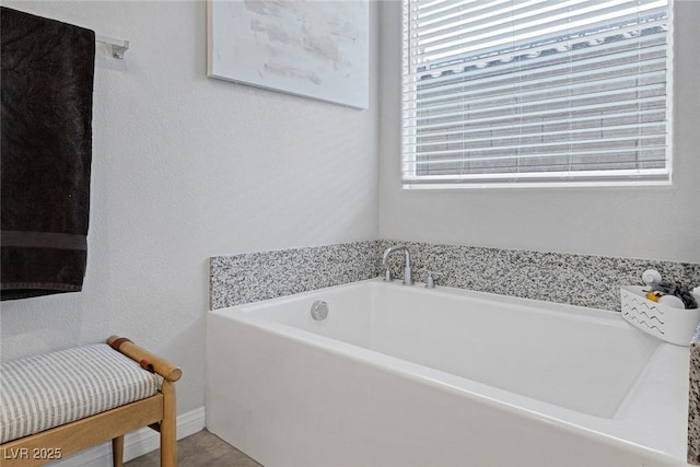 full bath featuring a garden tub