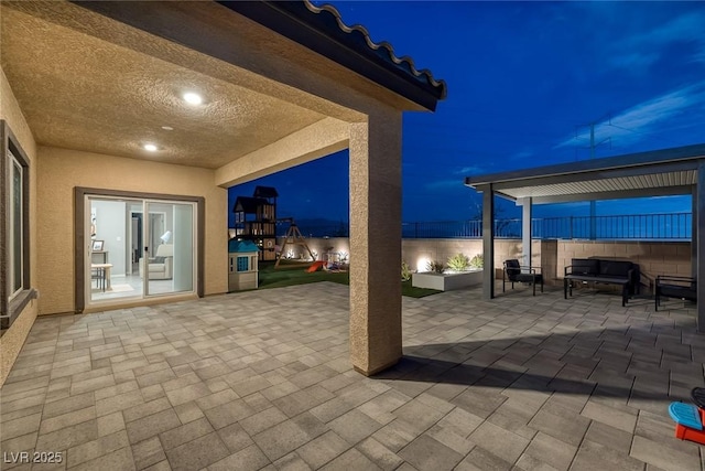 view of patio featuring a playground