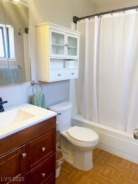 full bathroom with vanity, toilet, and shower / tub combo