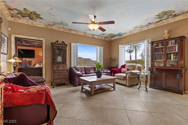 living room featuring light tile patterned floors and ceiling fan