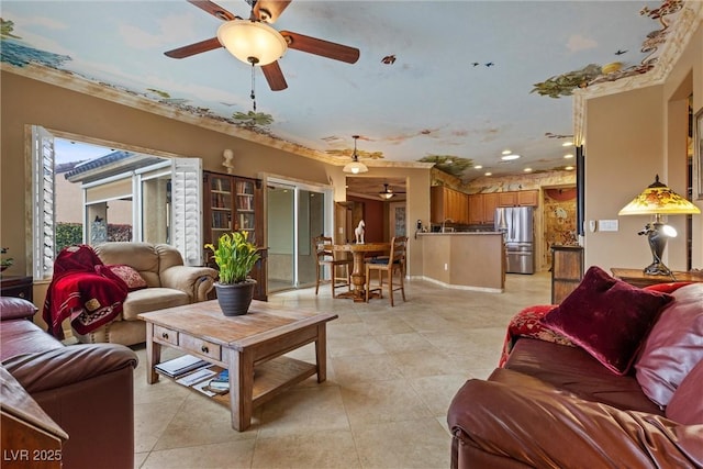 living room with light tile patterned flooring and ceiling fan